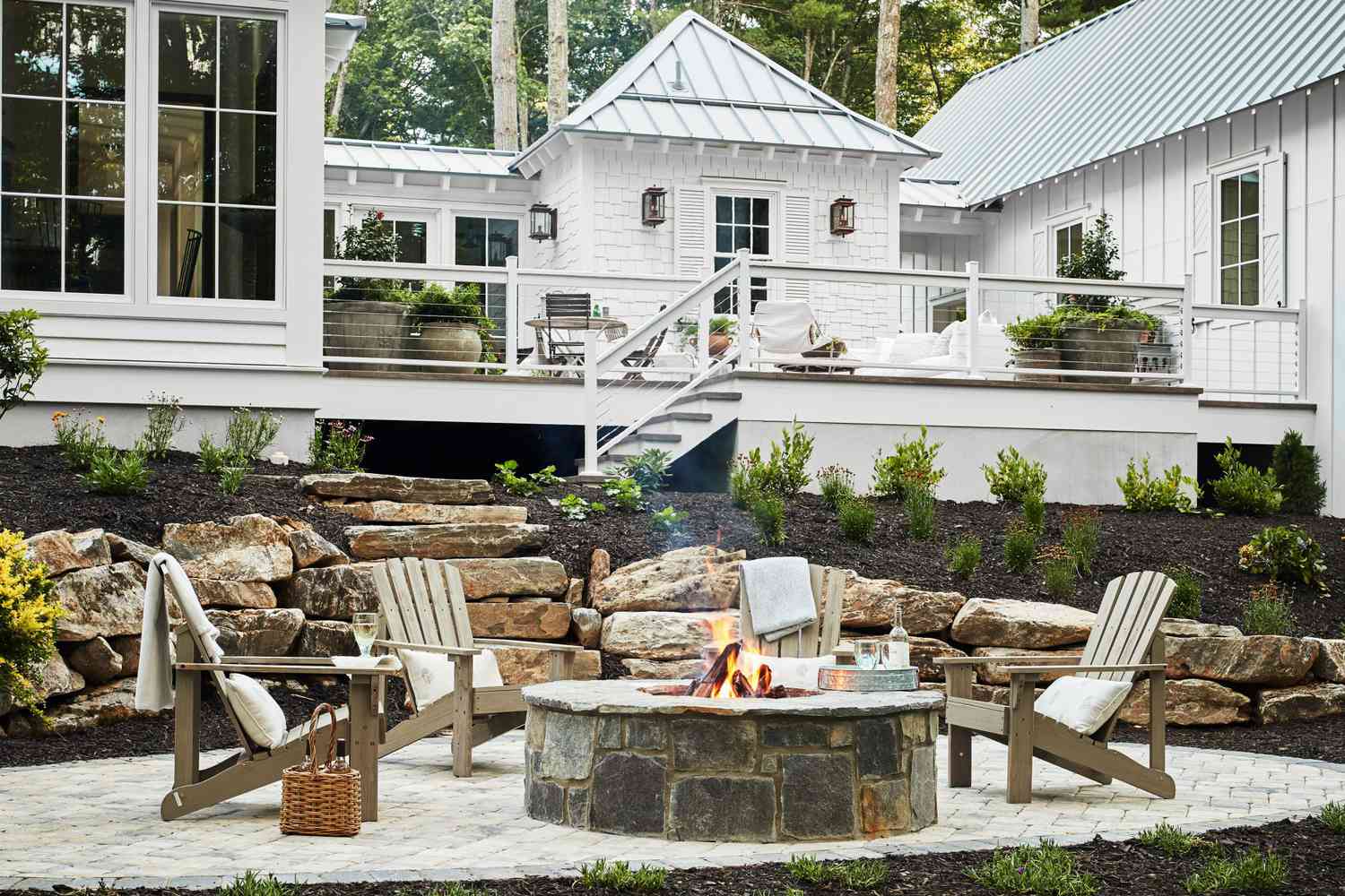 . A stylish pergola in an outdoor living space, offering shade and enhancing the home's aesthetic appeal