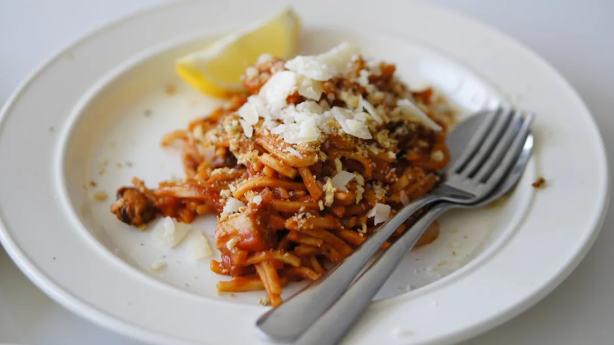 Multiple variations of garlic pasta including lemon and creamy versions